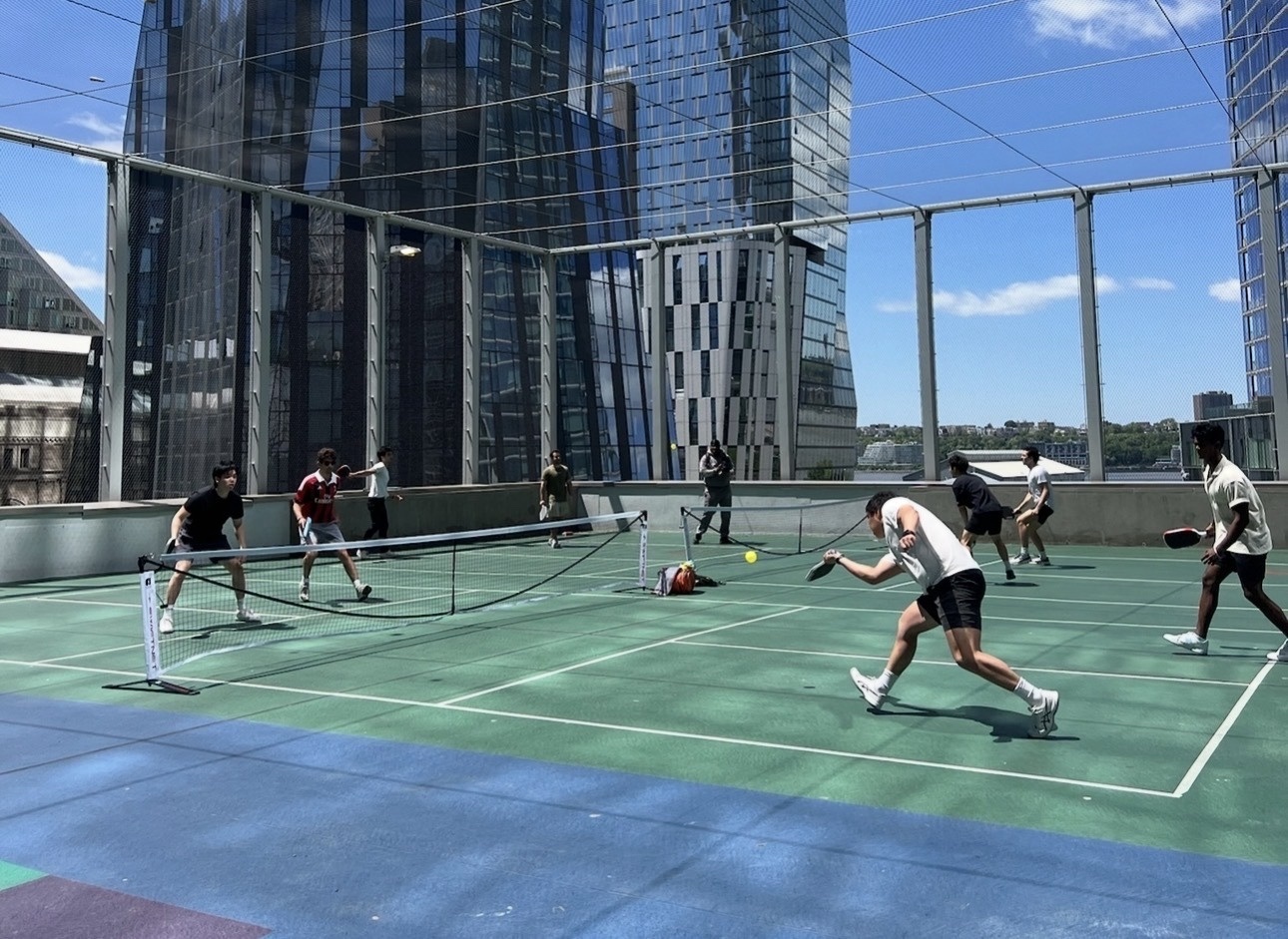Founders and investors at rooftop pickleball